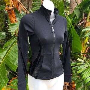 Good American sheer polkadot inside yoga jacket